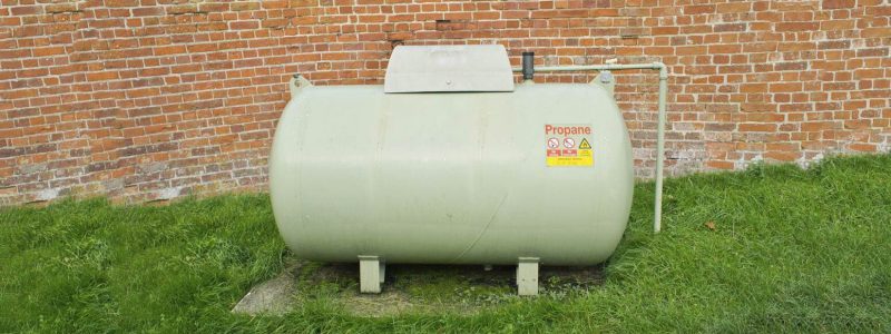 Liquid petroleum gas tank stood in a garden - LPG